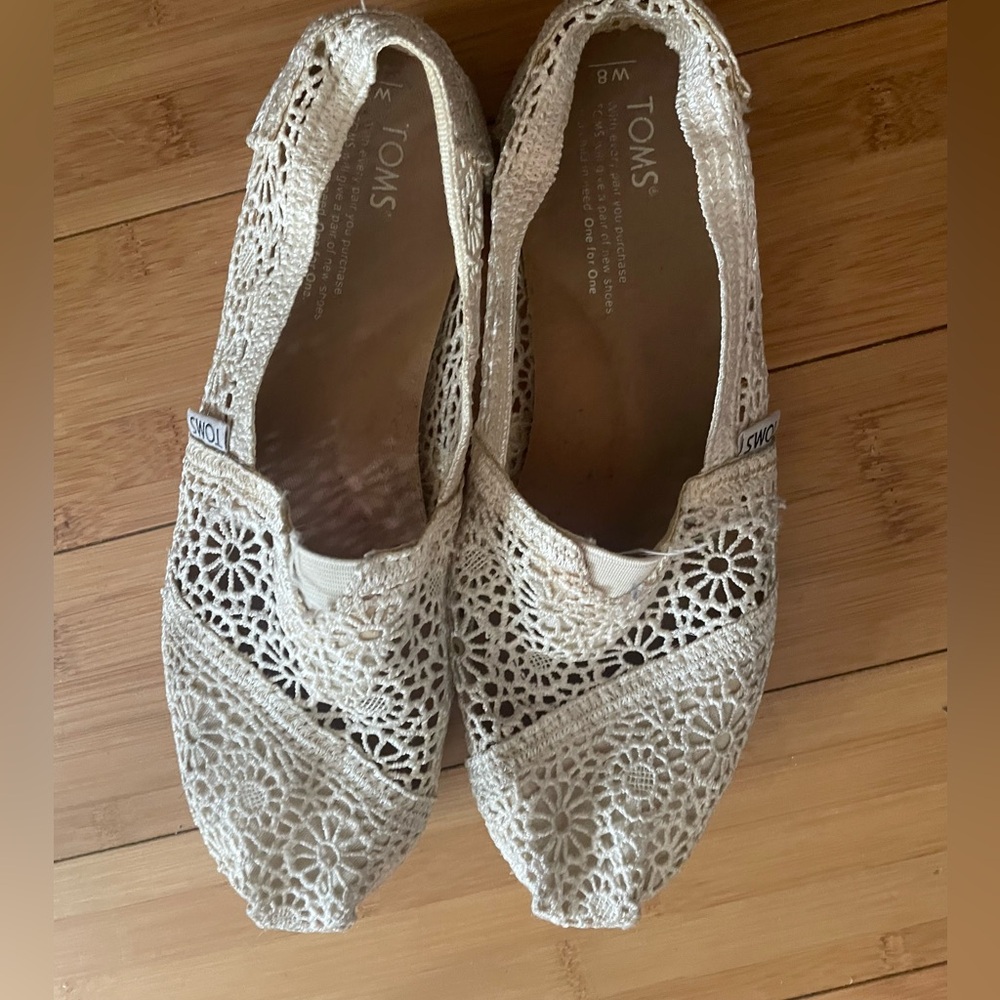 TOMS crochet cream colored slip ons size 8